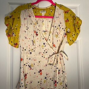 Anthropologie Cream Floral Wrap Blouse with Yellow Sleeves